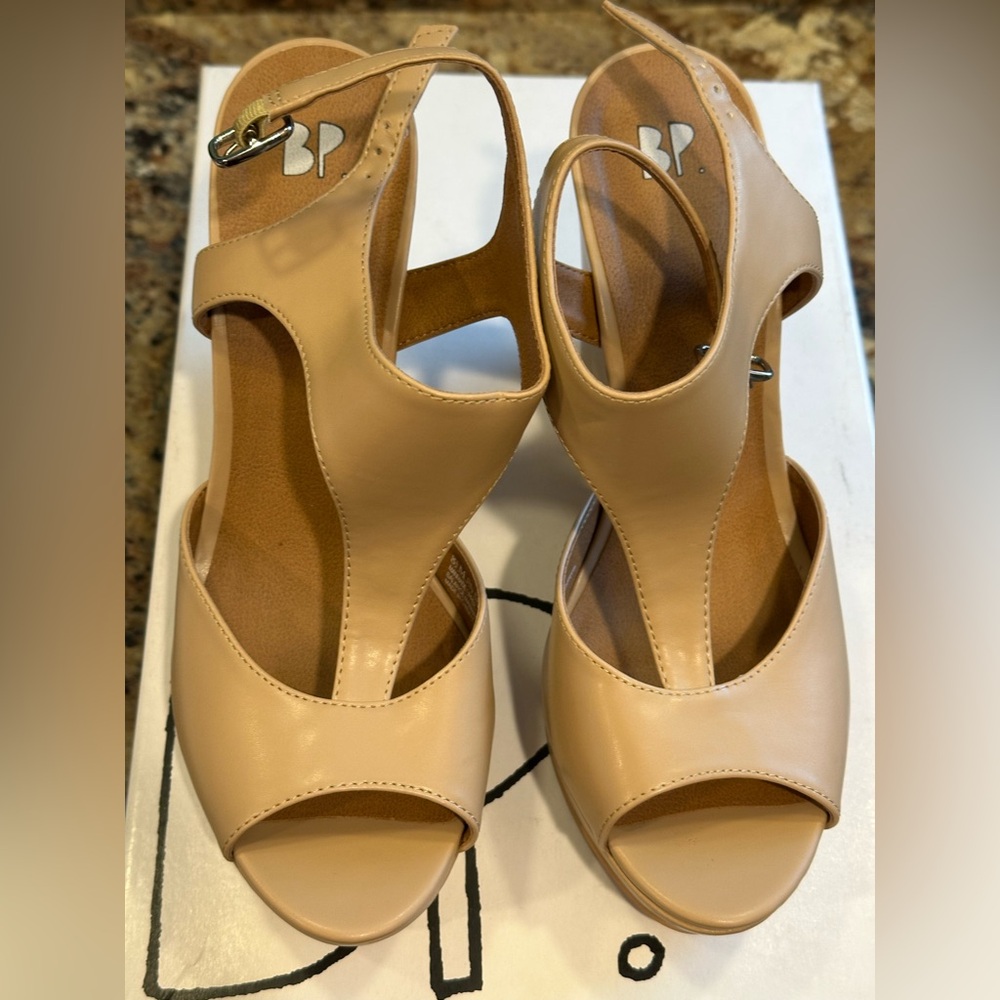 Size 8 1/2 women’s Brass Plum nude coloredwedge sandals, worn once.